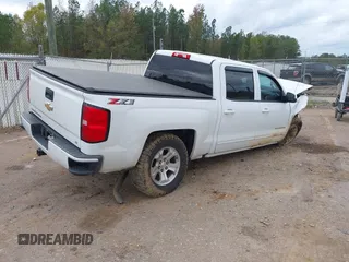 2018 Chevrolet Silverado 1500 LT with VIN 3GCUKREC3JG375591, listed as a IAAI auction lot 40887974 with 72,453 mi miles. Bid and sale history available at carsss.com. Image 4.