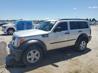 2007 Dodge Nitro SXT z VIN 1D8GT28K97W595592, wystawiony jako Copart lot #58141035 z przebiegiem 149 107 mil mil oraz Czysty tytuł • Clean title. Historia ofert i sprzedaży dostępna na DreamBid. Obrazek 1.