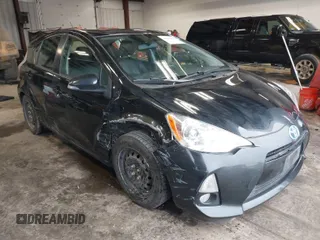 2012 Toyota Prius c One with VIN JTDKDTB39C1526082, listed as a IAAI auction lot 41619243 with 98,504 mi miles. Bid and sale history available at carsss.com. Image 1.