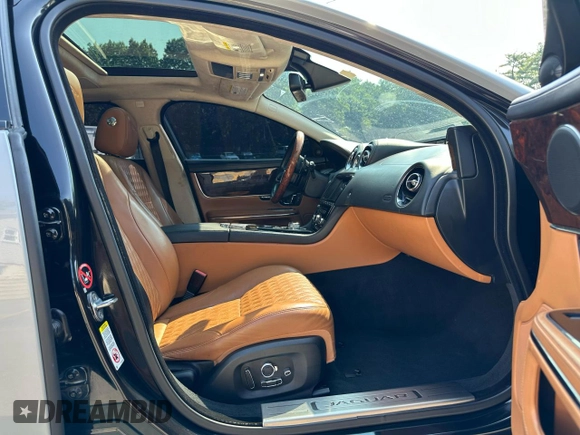 2016 Jaguar XJ Portfolio with VIN SAJWA2G7XG8V99511, listed as a Copart auction lot 63823895 with 102,082 mi miles and Clean title. Bid and sale history available at DreamBid. Image 6.