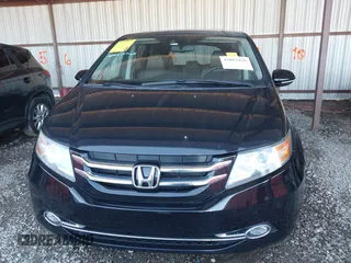 2014 Honda Odyssey Touring with VIN 5FNRL5H94EB110590, listed as a IAAI auction lot 42092929 with 242,338 mi miles and . Bid and sale history available at DreamBid. Image 13.