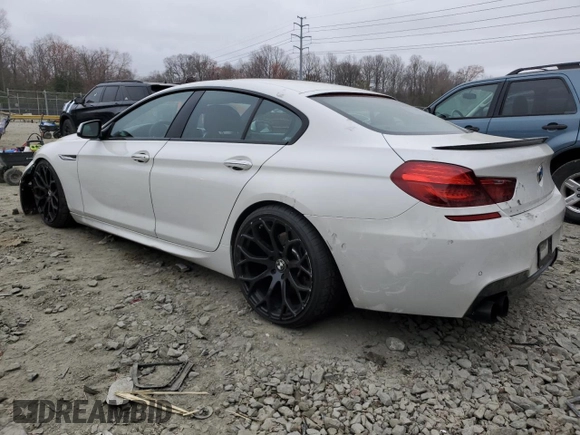 2014 BMW 6 Series 650i xDrive z VIN WBA6B4C54ED371324, wystawiony jako Copart lot #49016325 z przebiegiem 113 395 mil mil oraz Szkoda całkowita • Salvage title. Historia ofert i sprzedaży dostępna na DreamBid. Obrazek 2.