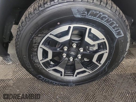 2023 Ford F-150 Lightning Pro z VIN 1FTVW1EL0PWG02840, wystawiony jako IAAI lot #42379448 z przebiegiem 52 710 mil mil oraz . Historia ofert i sprzedaży dostępna na DreamBid. Obrazek 31.