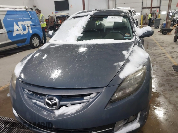 2009 Mazda 6 i Touring with VIN 1YVHP82A495M38694, listed as a IAAI auction lot 41577128 with 230,557 mi miles and . Bid and sale history available at carsss.com. Image 12.