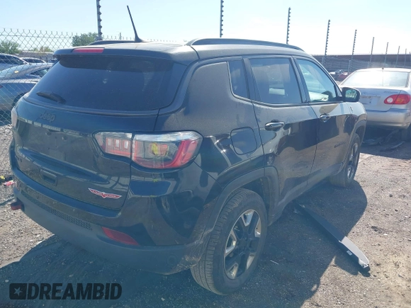 2018 Jeep Compass Trailhawk z VIN 3C4NJDDBXJT238593, wystawiony jako IAAI lot #42075447 z przebiegiem 122 064 mil mil oraz . Historia ofert i sprzedaży dostępna na DreamBid. Obrazek 4.