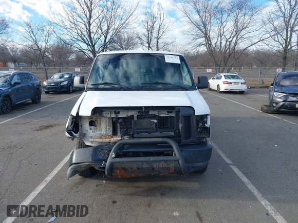 2011 Ford Econoline Cargo Commercial with VIN 1FTNE1EL5BDA40568, listed as a IAAI auction lot 41211154 with 182,527 mi miles and . Bid and sale history available at carsss.com. Image 12.