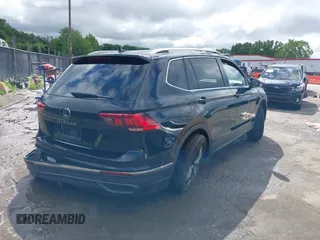 2023 Volkswagen Tiguan SE with VIN 3VV3B7AX4PM136264, listed as a IAAI auction lot 39724241 with 8,774 mi miles and . Bid and sale history available at DreamBid. Image 4.
