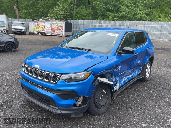2025 Jeep Compass Sport with VIN 3C4NJDAN5ST528384, listed as a Copart auction lot 56180685 with 4,982 mi miles and Salvage title. Bid and sale history available at DreamBid. Image 2.