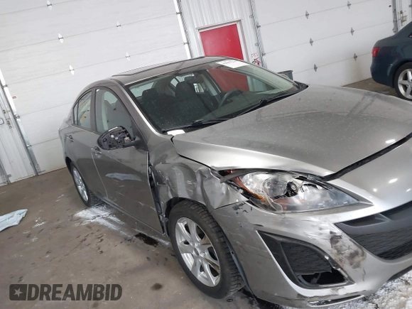 2011 Mazda Mazda3 i Touring with VIN JM1BL1VFXB1900999, listed as a IAAI auction lot 42067239 with 202,829 mi miles. Bid and sale history available at carsss.com. Image 6.