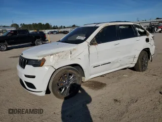 2018 Jeep Grand Cherokee High Altitude with VIN 1C4RJECG1JC125602, listed as a Copart auction lot 88702275 with 59,701 mi miles and Salvage title. Bid and sale history available at DreamBid. Image 1.