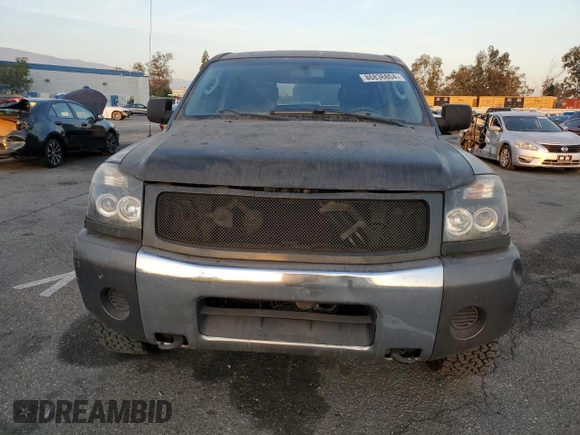 2007 Nissan Titan XE with VIN 1N6AA07A07N217705, listed as a Copart auction lot 86836804 with 272,228 mi miles and Salvage Title. Bid and sale history available at DreamBid. Image 5.