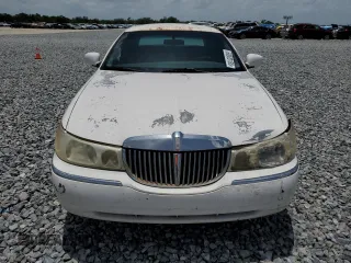 1999 Lincoln Town Car Executive z VIN 1LNHM81WXXY627319, wystawiony jako Copart lot #60830165 z przebiegiem 122 118 mil mil oraz Szkoda całkowita • Salvage title. Historia ofert i sprzedaży dostępna na DreamBid. Obrazek 5.