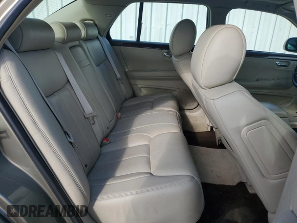 2011 Cadillac DTS Premium Collection z VIN 1G6KH5E66BU122663, wystawiony jako Copart lot #73112894 z przebiegiem 140 360 mil mil oraz Szkoda całkowita • Salvage title. Historia ofert i sprzedaży dostępna na DreamBid. Obrazek 10.