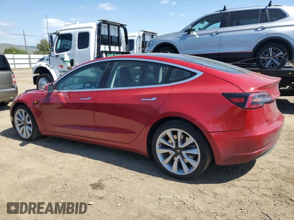 2018 Tesla Model 3 Long Range Battery z VIN 5YJ3E1EA4JF061733, wystawiony jako Copart lot #54885335 z przebiegiem 84 700 mil mil oraz Szkoda całkowita • Salvage title. Historia ofert i sprzedaży dostępna na DreamBid. Obrazek 2.