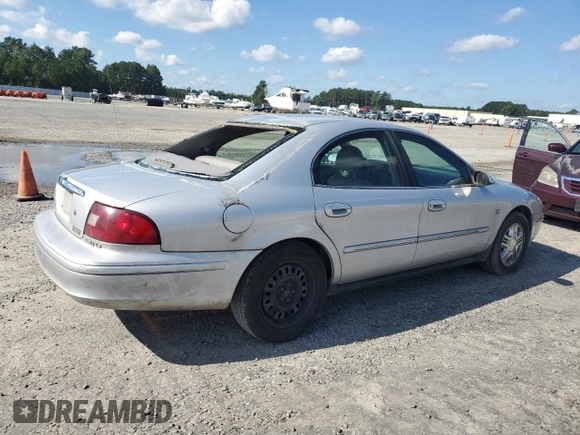 2003 Mercury Sable LS with VIN 1MEHM55S73A619013, listed as a Copart auction lot 73504154 with 200,135 mi miles and Salvage Title. Bid and sale history available at DreamBid. Image 3.
