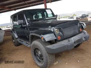 2008 Jeep Wrangler Unlimited Sahara with VIN 1J8GA59128L542384, listed as a IAAI auction lot 42184176 with 152,768 mi miles and . Bid and sale history available at DreamBid. Image 1.