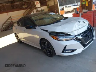 2020 Nissan Sentra SR z VIN 3N1AB8DV0LY290420, wystawiony jako IAAI lot #40879831 z przebiegiem 104 638 mil mil oraz . Historia ofert i sprzedaży dostępna na DreamBid. Obrazek 1.