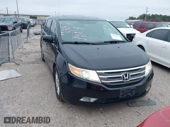 2013 Honda Odyssey Touring with VIN 5FNRL5H9XDB073706, listed as a IAAI auction lot 41591111 with 158,305 mi miles and . Bid and sale history available at carsss.com. Image 1.