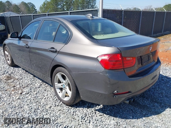 2014 BMW 3 Series 328i with VIN WBA3A5G57ENP28138, listed as a IAAI auction lot 41760371 with 147,897 mi miles and . Bid and sale history available at DreamBid. Image 3.