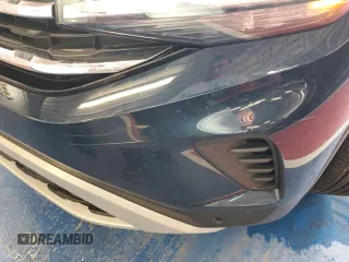 2023 Volkswagen Atlas SE z VIN 1V2HR2CA5PC527628, wystawiony jako IAAI lot #42569146 z przebiegiem 27 424 mil mil oraz . Historia ofert i sprzedaży dostępna na DreamBid. Obrazek 19.