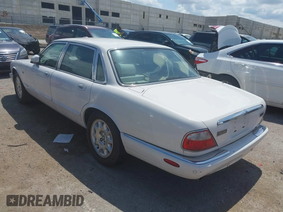 2003 Jaguar XJ 8 with VIN SAJDA14C03LF52338, listed as a IAAI auction lot 42684038 with 142,107 mi miles and . Bid and sale history available at DreamBid. Image 3.