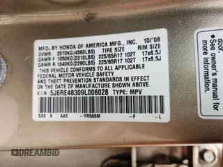 2009 Honda CR-V LX z VIN 5J6RE48309L006028, wystawiony jako Copart lot #58186465 z przebiegiem 214 896 mil mil oraz Szkoda całkowita • Salvage title. Historia ofert i sprzedaży dostępna na DreamBid. Obrazek 14.