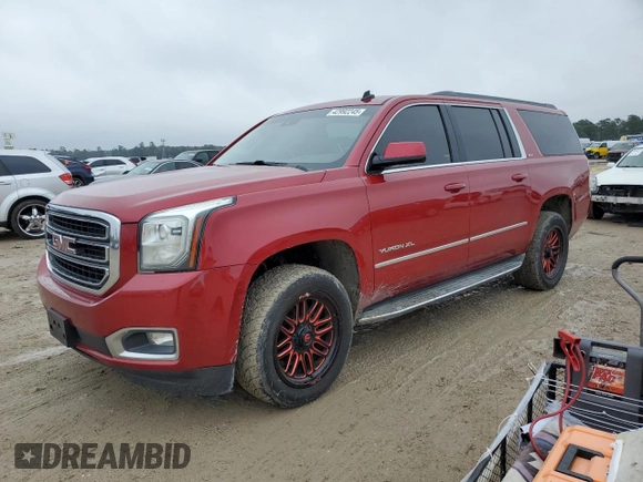 2015 GMC Yukon XL SLT with VIN 1GKS1HKC0FR113662, listed as a Copart auction lot 42992245 with 186,904 mi miles and Salvage Title. Bid and sale history available at carsss.com. Image 1.