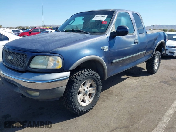 2003 Ford F-150 XL with VIN 1FTRX18WX3NA22323, listed as a IAAI auction lot 41635869 with 129,029 mi miles. Bid and sale history available at carsss.com. Image 2.