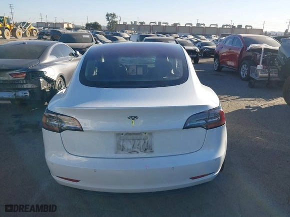 2018 Tesla Model 3 Long Range Battery with VIN 5YJ3E1EA6JF042844, listed as a IAAI auction lot 41349172 with 122,851 mi miles. Bid and sale history available at carsss.com. Image 16.