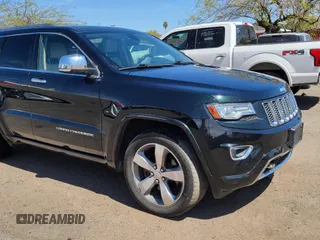 2014 Jeep Grand Cherokee Overland with VIN 1C4RJFCT7EC187319, listed as a Copart auction lot 52506115 with 98,314 mi miles and Clean Title. Bid and sale history available at carsss.com. Image 1.