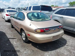 1997 Ford Taurus GL z VIN 1FALP52U9VA280563, wystawiony jako IAAI lot #42045413 z przebiegiem 219 484 mil mil oraz . Historia ofert i sprzedaży dostępna na DreamBid. Obrazek 12.