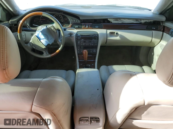 2003 Cadillac Seville Touring STS z VIN 1G6KY54923U101998, wystawiony jako Copart lot #74029304 z przebiegiem 134 157 mil mil oraz Szkoda całkowita • Salvage title. Historia ofert i sprzedaży dostępna na DreamBid. Obrazek 8.