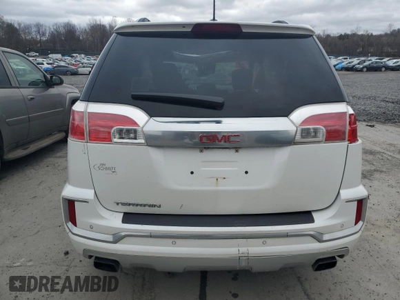 2016 GMC Terrain Denali z VIN 2GKFLRE32G6146804, wystawiony jako Copart lot #52802405 z przebiegiem Nie podano mil oraz Szkoda całkowita • Salvage title. Historia ofert i sprzedaży dostępna na DreamBid. Obrazek 6.