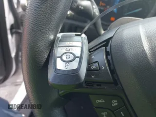 2020 Ford Fusion SE z VIN 3FA6P0LU5LR153942, wystawiony jako IAAI lot #42145638 z przebiegiem 99 961 mil mil oraz . Historia ofert i sprzedaży dostępna na DreamBid. Obrazek 11.