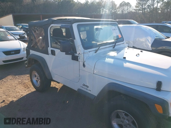 2004 Jeep Wrangler Sport Right Hand Drive with VIN 1J4F449S74P732854, listed as a IAAI auction lot 41408316 with 112,064 mi miles. Bid and sale history available at carsss.com. Image 6.