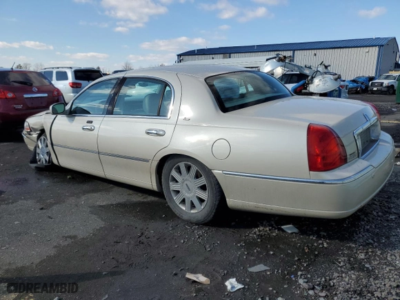 2003 Lincoln Town Car Cartier with VIN 1LNHM83WX3Y704827, listed as a Copart auction lot 44561495 with 89,936 mi miles and Salvage Title. Bid and sale history available at carsss.com. Image 2.