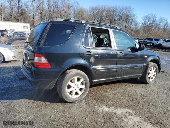 2001 Mercedes-Benz M-Class with VIN 4JGAB72EX1A277472, listed as a Copart auction lot 86857214 with 0 mi miles and Salvage Title. Bid and sale history available at carsss.com. Image 3.