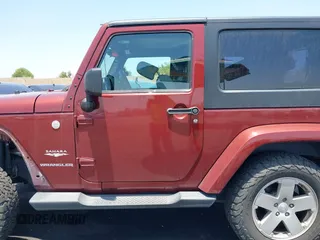 2010 Jeep Wrangler Sahara z VIN 1J4AA5D14AL125062, wystawiony jako IAAI lot #42418736 z przebiegiem 90 839 mil mil oraz . Historia ofert i sprzedaży dostępna na DreamBid. Obrazek 15.