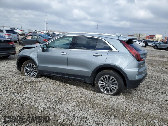2024 Cadillac XT4 AWD Premium Luxury with VIN 1GYFZDR40RF123637, listed as a Copart auction lot 46852195 with 5,001 mi miles and Salvage title. Bid and sale history available at DreamBid. Image 2.