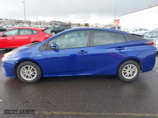 2016 Toyota Prius Two with VIN JTDKBRFUXG3514948, listed as a IAAI auction lot 41777344 with 128,471 mi miles. Bid and sale history available at carsss.com. Image 14.