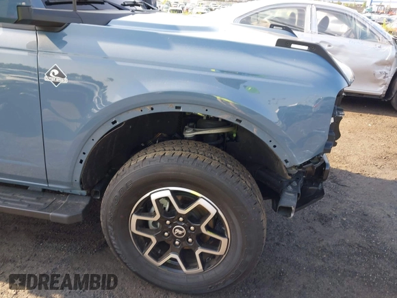 2024 Ford Bronco Outer Banks z VIN 1FMDE8BH3RLB41205, wystawiony jako IAAI lot #42558633 z przebiegiem 1 457 mil mil oraz . Historia ofert i sprzedaży dostępna na DreamBid. Obrazek 19.