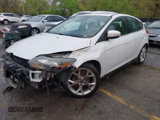 2012 Ford Focus Titanium with VIN 1FAHP3N29CL415935, listed as a IAAI auction lot 42004275 with 227,262 mi miles and . Bid and sale history available at carsss.com. Image 2.