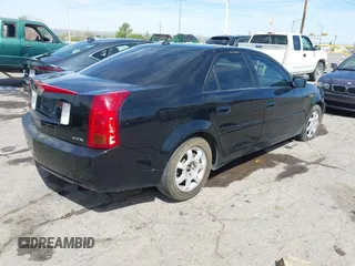 2004 Cadillac CTS with VIN 1G6DM577140177980, listed as a IAAI auction lot 42083612 with 237,640 mi miles. Bid and sale history available at carsss.com. Image 4.