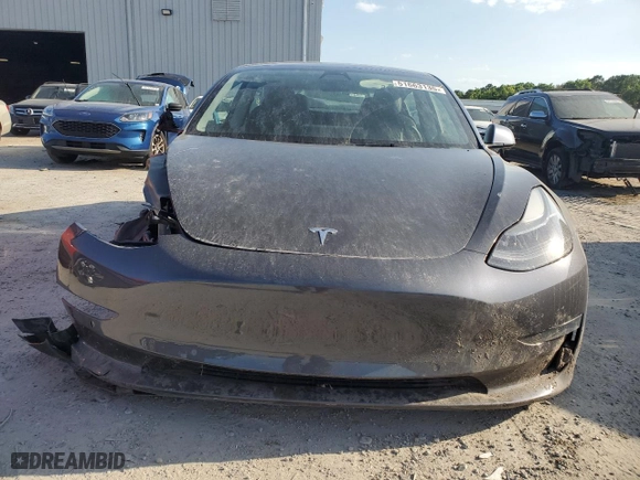 2021 Tesla Model 3 Standard Range Plus with VIN 5YJ3E1EA5MF090808, listed as a Copart auction lot 51663135 with 52,189 mi miles and Clean Title. Bid and sale history available at carsss.com. Image 5.