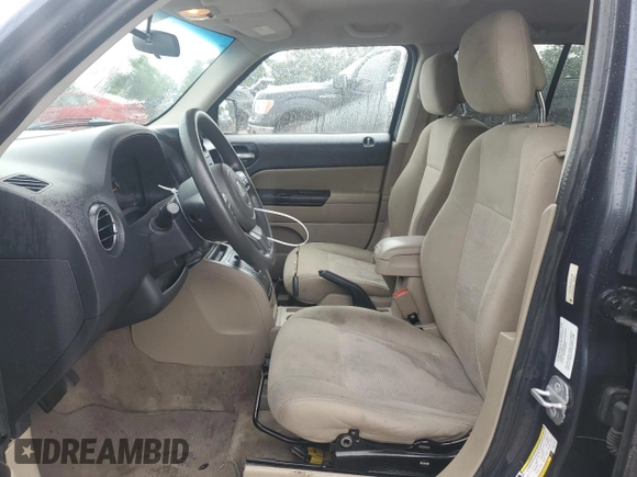 2014 Jeep Patriot Sport with VIN 1C4NJPBA0ED601488, listed as a Copart auction lot 63791785 with 204,926 mi miles and Salvage title. Bid and sale history available at DreamBid. Image 7.