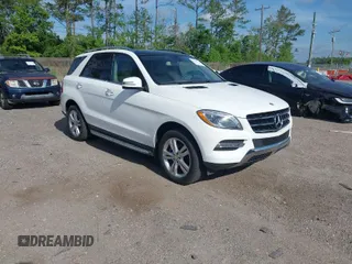 2015 Mercedes-Benz M ML 350 with VIN 4JGDA5HB6FA608539, listed as a IAAI auction lot 41972173 with 102,190 mi miles. Bid and sale history available at carsss.com. Image 1.