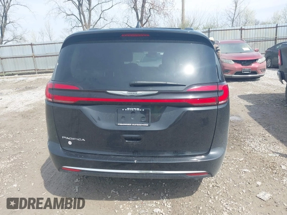 2022 Chrysler Pacifica Touring L with VIN 2C4RC1BG3NR181915, listed as a IAAI auction lot 41946833 with 69,590 mi miles and . Bid and sale history available at DreamBid. Image 17.