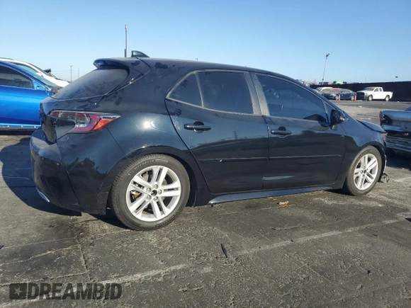 2021 Toyota Corolla Hatchback SE with VIN JTNB4MBE1M3106051, listed as a Copart auction lot 73013984 with 54,630 mi miles and Salvage Title. Bid and sale history available at carsss.com. Image 3.