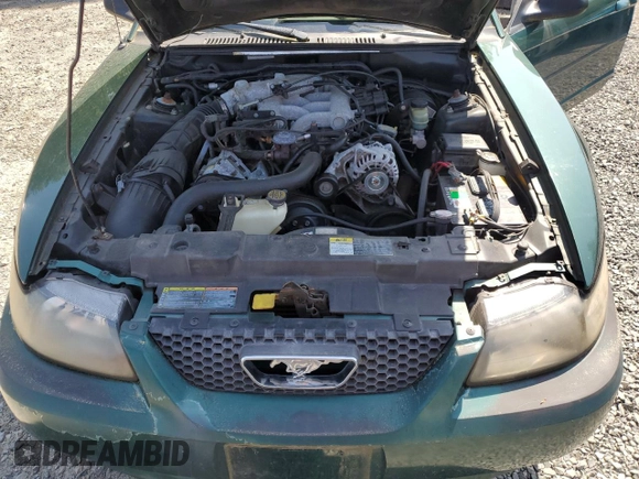 2002 Ford Mustang Standard z VIN 1FAFP404X2F118823, wystawiony jako Copart lot #54343305 z przebiegiem 159 482 mil mil oraz Szkoda całkowita • Salvage title. Historia ofert i sprzedaży dostępna na DreamBid. Obrazek 11.