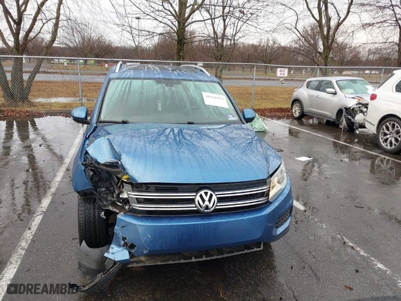 2017 Volkswagen Tiguan Wolfsburg Edition with VIN WVGSV7AX9HK007880, listed as a IAAI auction lot 41111974 with 89,804 mi miles. Bid and sale history available at carsss.com. Image 12.